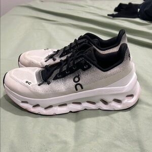 On Running Cloudstratus Shoes in White and Black